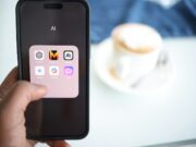 Cara Membuat ChatGPT Sendiri Menggunakan Ollama untuk Windows, Mac OS, dan Linux a person holding a cell phone in their hand